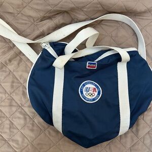 Navy Blue Round Shoulder Bag with White Straps